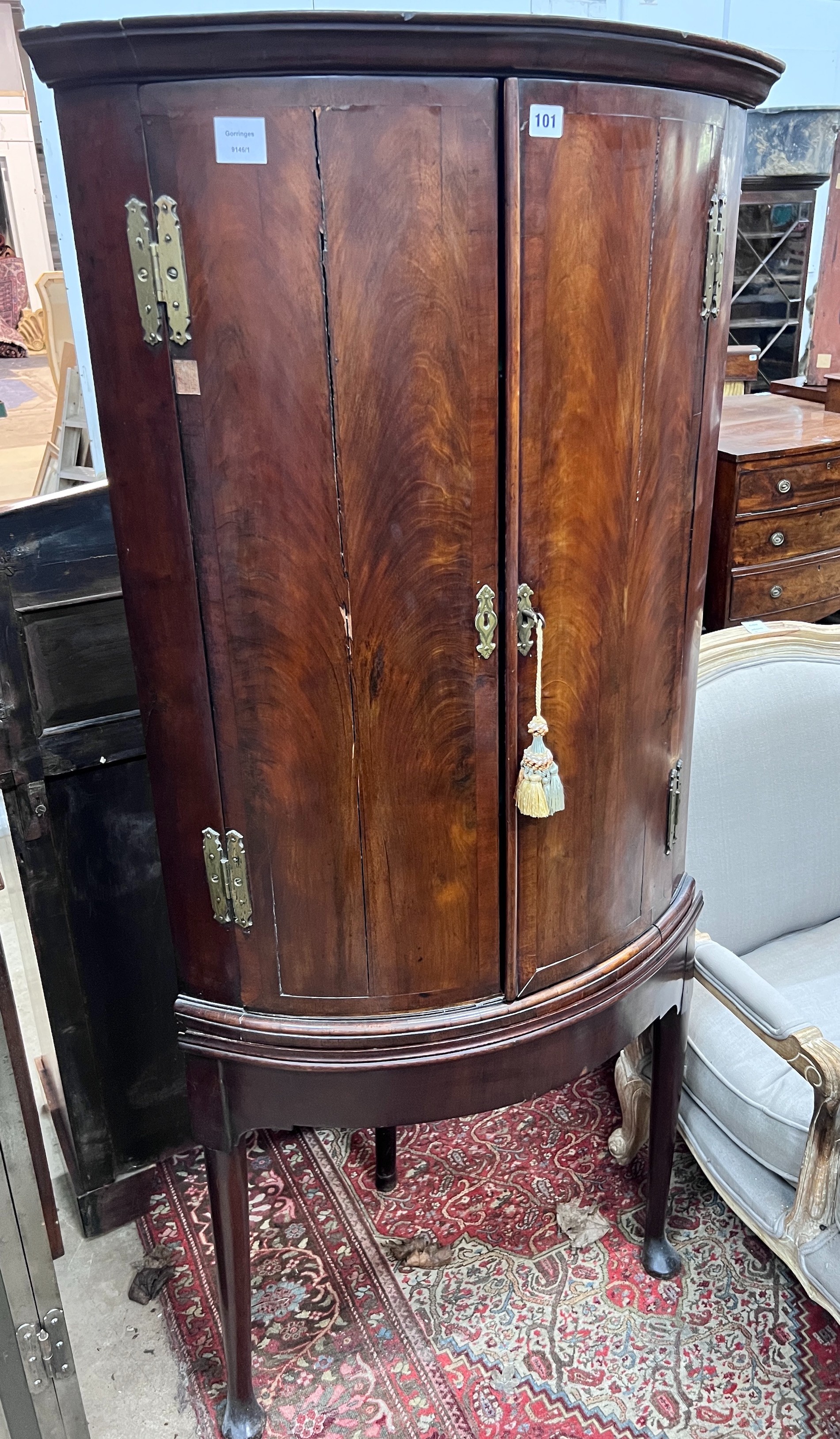 A George III mahogany bowfront corner cabinet on stand, width 72cm, depth 50cm, height 167cm *Please note the sale commences at 9am.